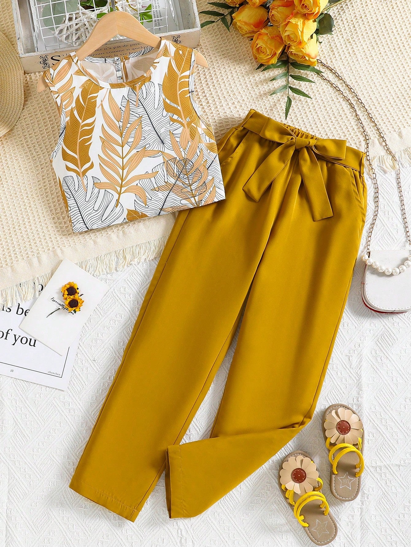 Girls two piece outfit with tropical leaf print sleeveless top and mustard yellow Pant Set