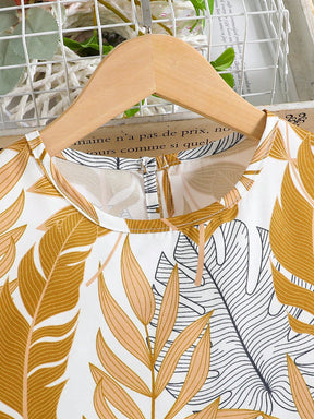 Girls two piece outfit with tropical leaf print sleeveless top and mustard yellow Pant Set