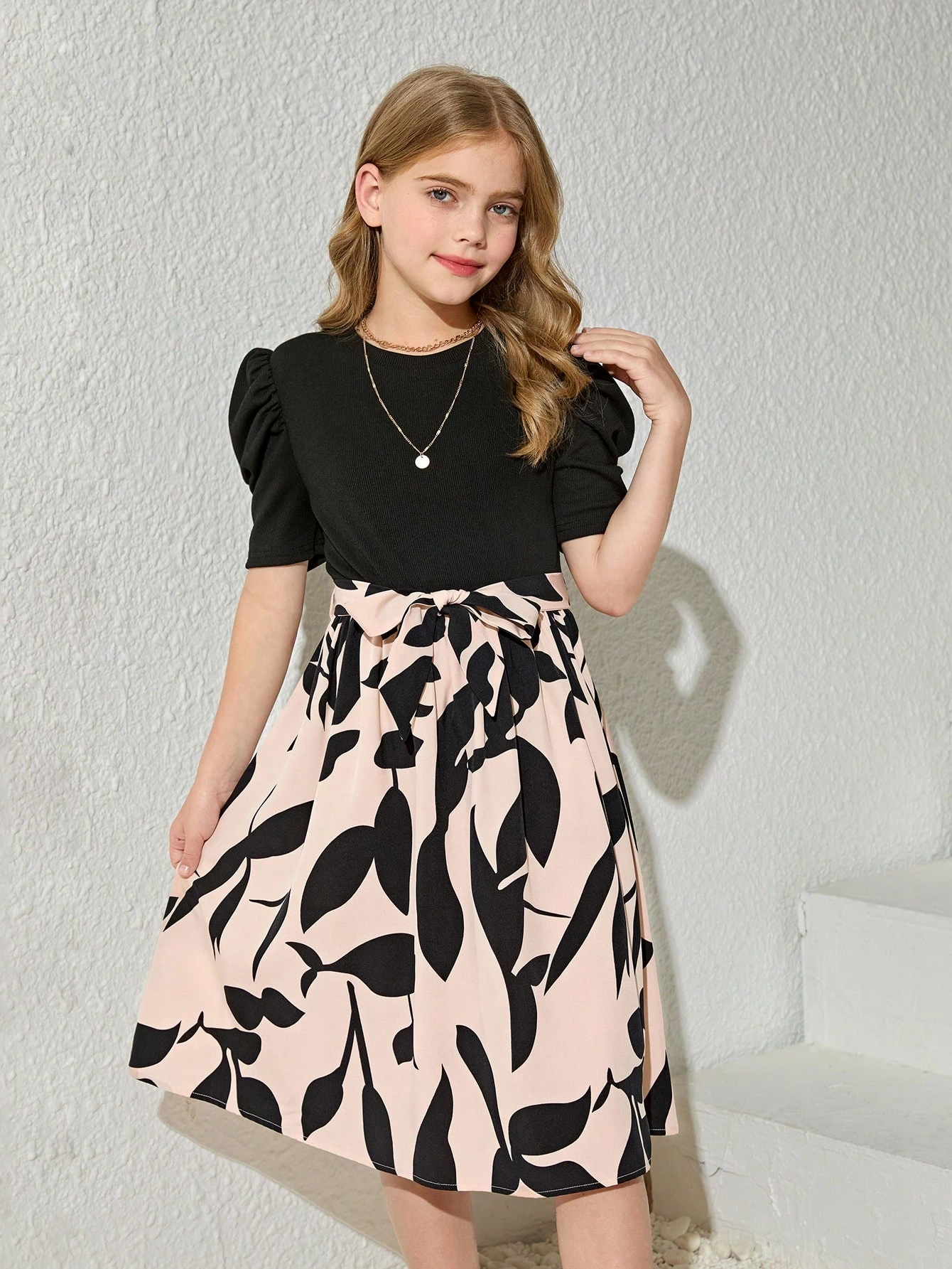 Elegant Girls Puff Sleeve Black Top with Chic Black & White Leaf Print Skirt Set