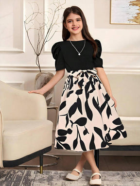 Elegant Girls Puff Sleeve Black Top with Chic Black & White Leaf Print Skirt Set